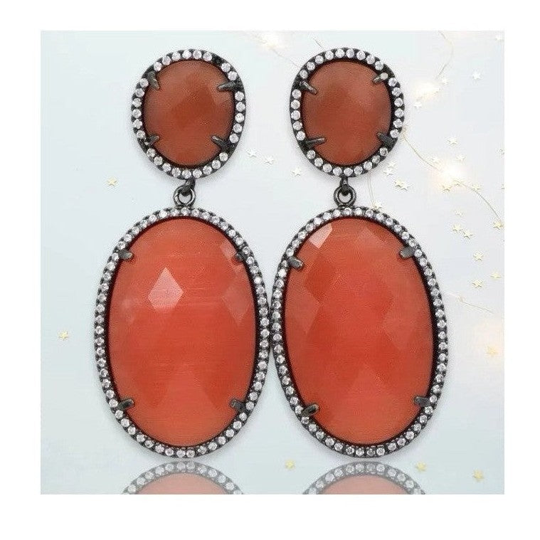 Hermione gunmetal dangling crystal earrings with orange oval stones