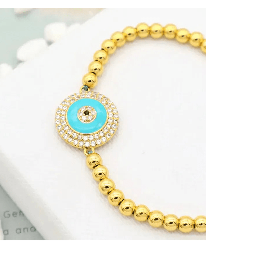 Gold plated evil eye bracelet with turquoise center and zirconia crystals