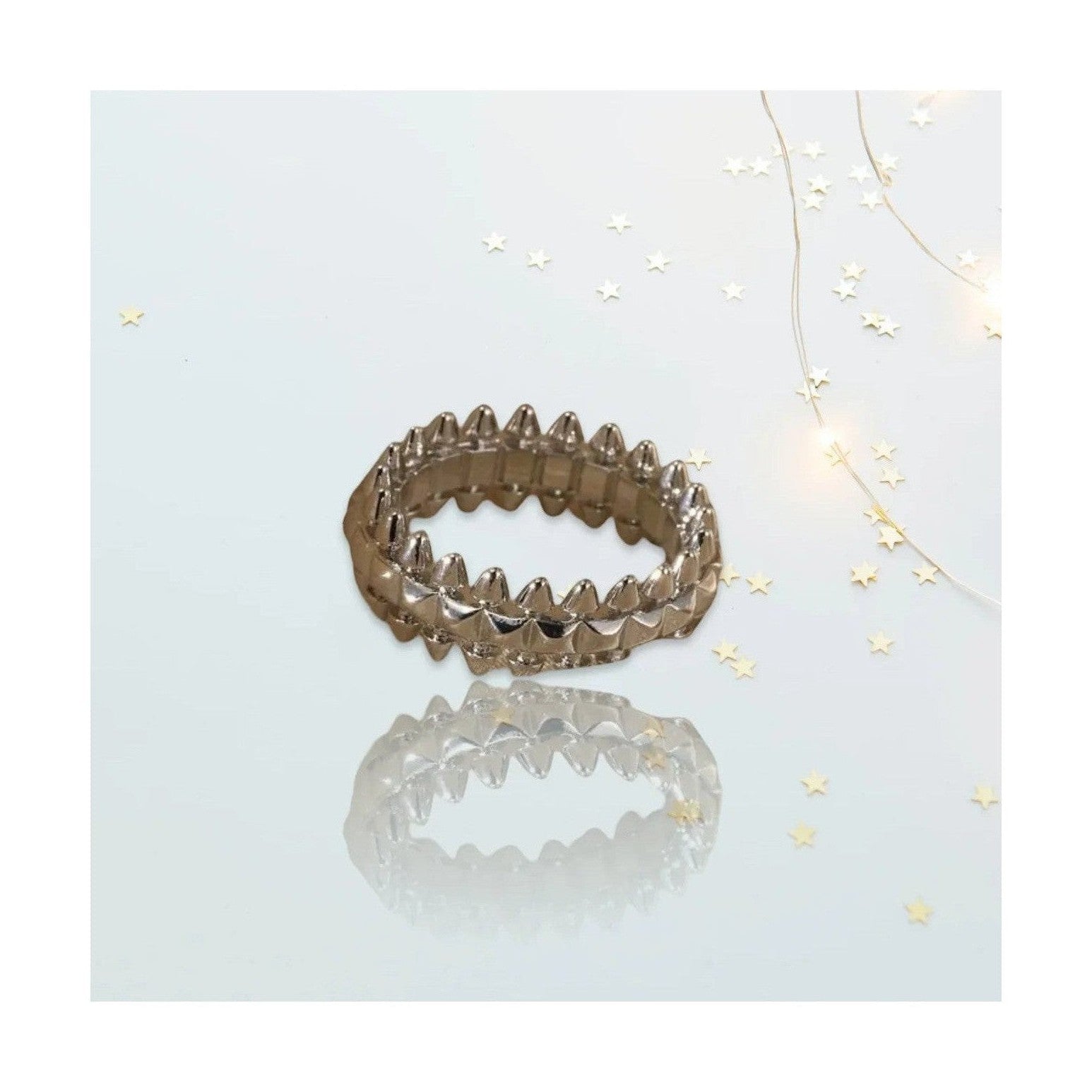 Silver adjustable ring with spiked saw-tooth edge design